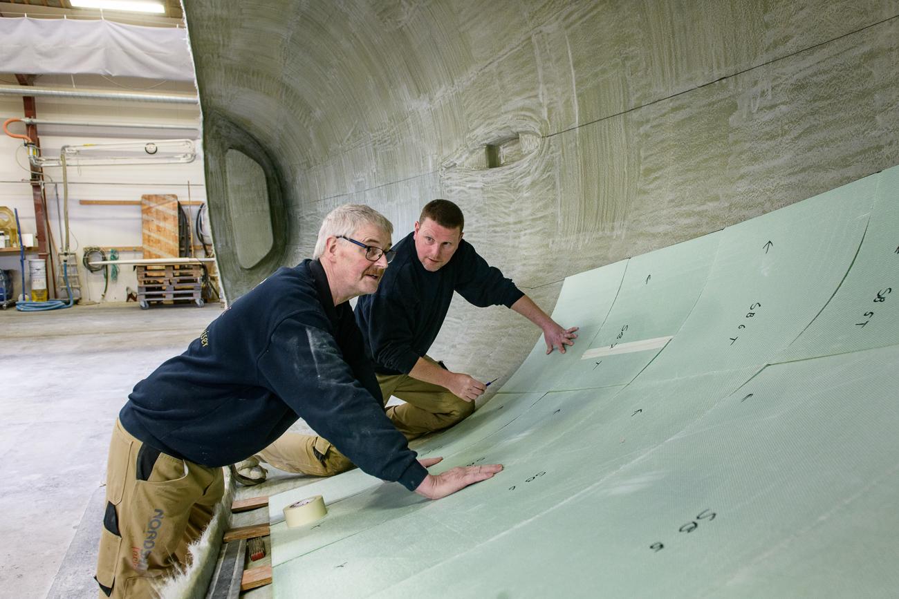 Specialised craftsmen assembling the hull construction